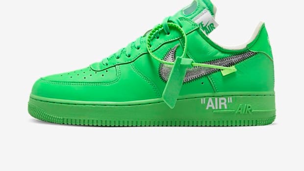 Green Nike Air Force 1 shoe.